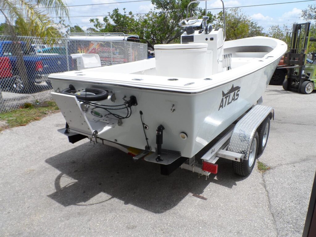 Atlas Boatworks 23F stern view of 3-degree deadrise. White porta Bracket attached and engine wires coiled up.