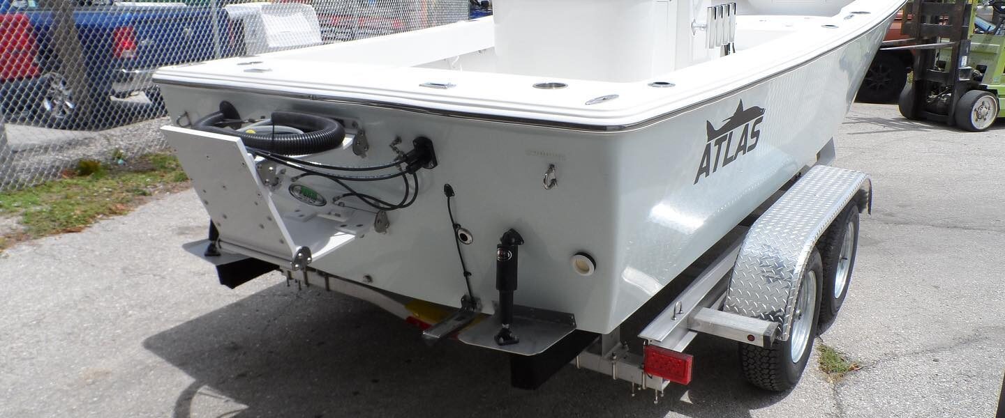 Atlas Boatworks 23F stern view of 3-degree deadrise. White porta Bracket attached and engine wires coiled up.