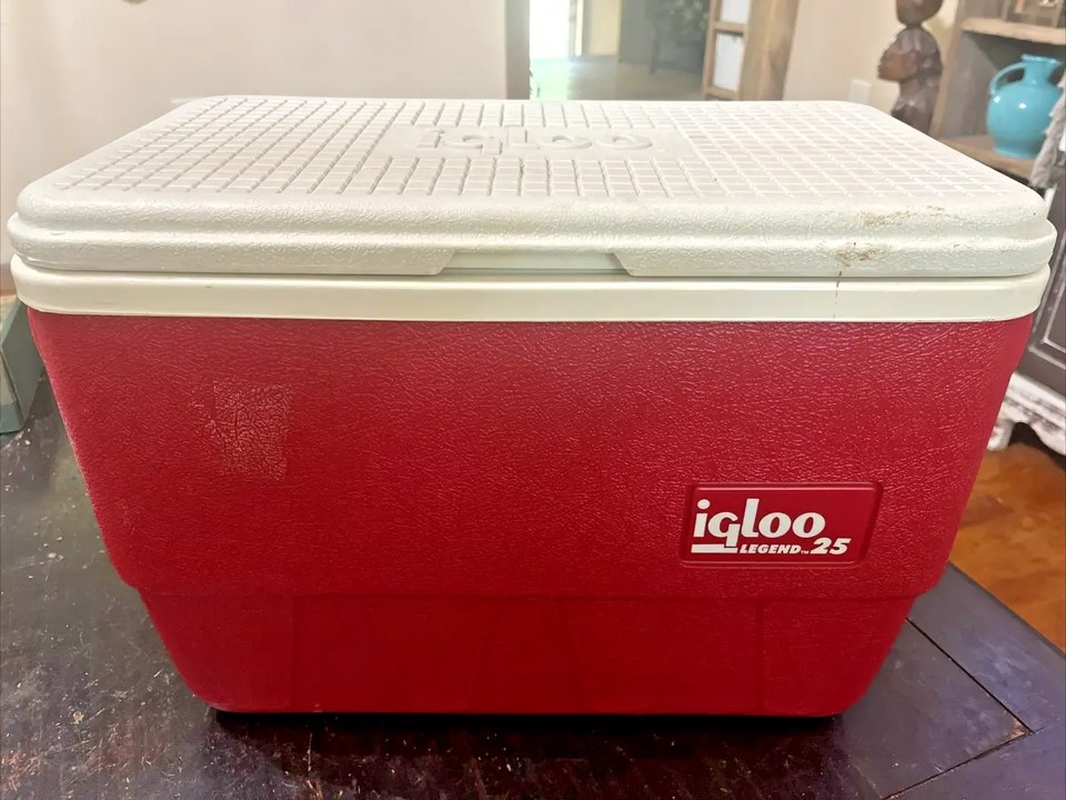 A red igloo cooler