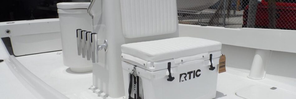 Atlas Boatworks 23F console and cooler seat with white cushion on top. 4 side-mount rod holders.