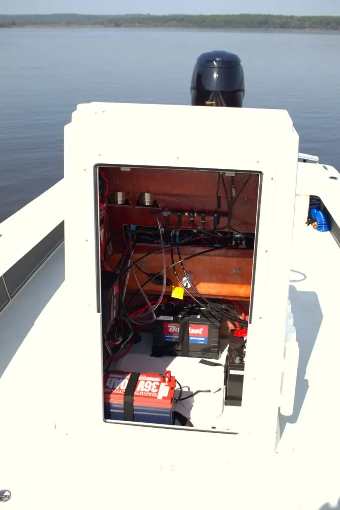 The door on the center console of the Atlas Boatworks 23F bay boat fully open