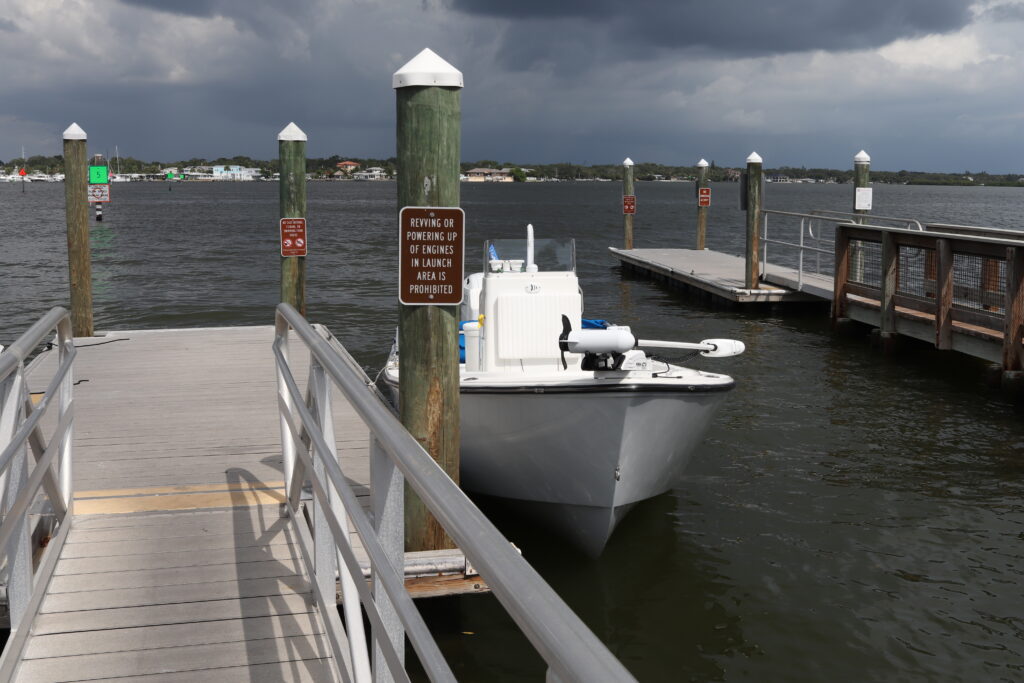 Atlas Boatworks 23F docked at Bay Pines Boat Ramp