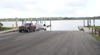 An Atlas Boatworks 23F bay boat on the boat ramp at WO Thomas Boat Landing in Charleston, SC