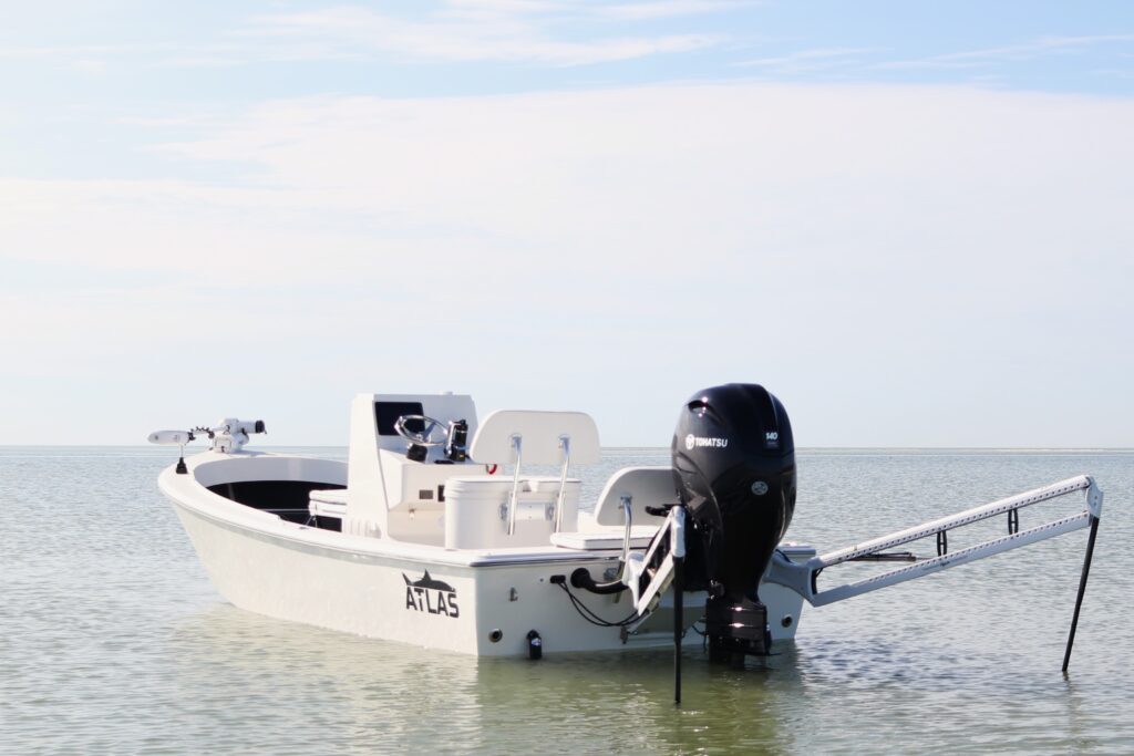 Atlas Boatworks 23F bay boat sits at anchor